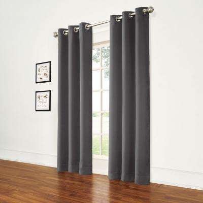 Grommet-top curtains hanging beside a window